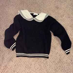 Elegant Black and White Women's Sweater with Collar